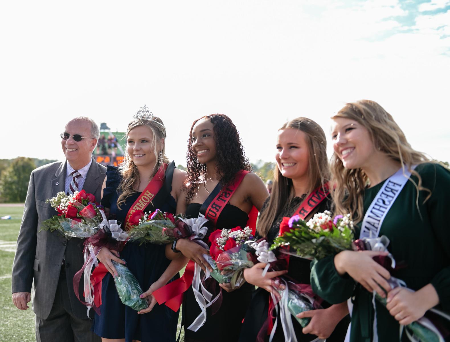 Savannah Gregory, representing FCA, second from right, was crowned Campbellsville University's 2019 Homecoming Queen. Dr. Michael V. Carter, president, is at far right. From left are: Ali Flaherty, freshman attendant; Hannah Kennedy, second runner-up, representing the Office of University Communications; Krystan Armstrong, first runner-up, representing the Black Student Association. (Campbellsville University Photo by Joshua Williams)