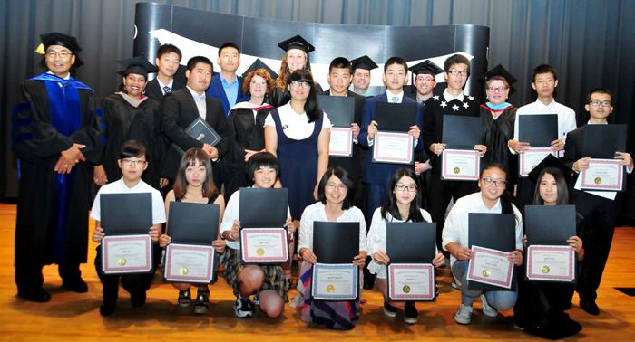 Students from Beijing Information Management Schools (BIMS), China, receiving their ESL participation certificate at Campbellsville University. (Campbellsville University photo by Joshua Williams)